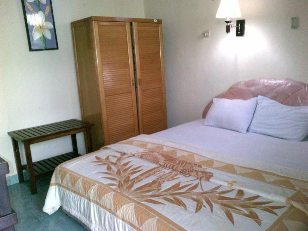 Adus Beach Inn Legian Quarto foto